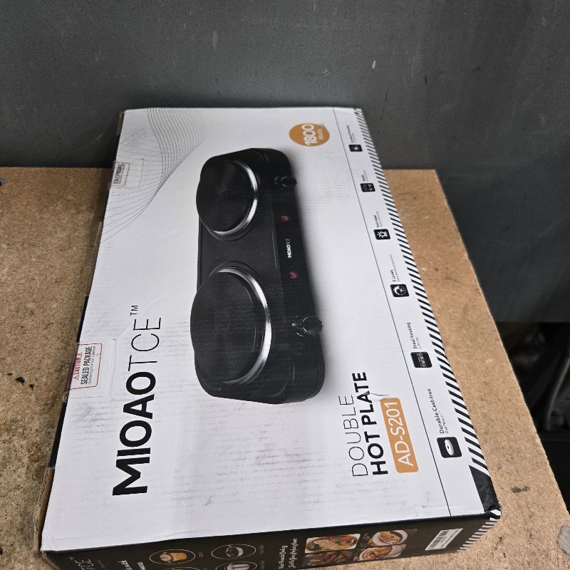 Photo 1 of **FACTORY SEALED** MIOAOTCE Countertop Double Cast Iron Burner 1800 Watts Electric Hot Plate with Adjustable Temperature 6.1" Cooktop for Dorm, Office, Home, Camp, Compatible for All Cookwares