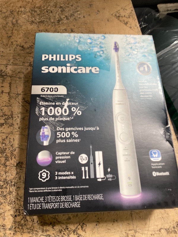Photo 1 of **Not charging** Philips Sonicare 6700 Series Electric Toothbrush, Pressure Sensor, 9 Brushing Settings, SmarTimer, BrushPacer, 21-Day Runtime, Travel Case, for Gum Health & Sensitive Teeth, White, HX7410/07