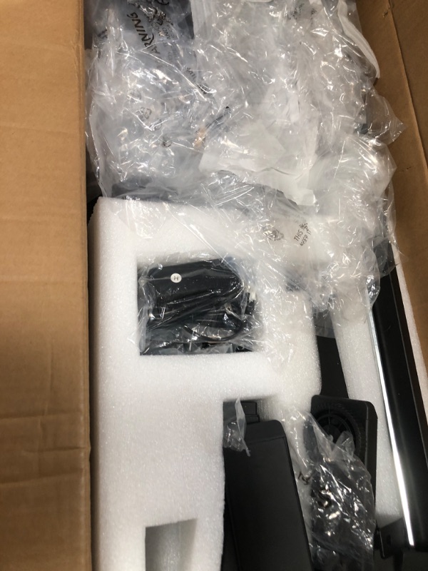 Photo 1 of **unknown if missing parts** Gaming Standing Desk with LED Lights & Host Shelf, 55" x 24" Gaming Table with Music Sensing APP Control, Underdesk Cable Storage Electric Standing Desk, Black Carbon Fiber PC Table for Home Office