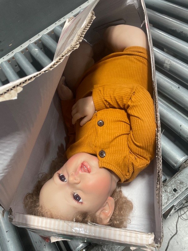 View 3 of **ARM IS FALLING OFF**Pinky Reborn Baby Doll 28 Inch