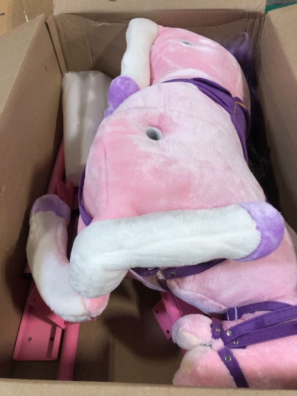 Photo 1 of ***MISSING HARDWARE*** Spring Rocking Horse - Plush Bouncy Ride-On Toy with Fun Sounds, Wood Handles, and Adjustable Stirrups for Kids Ages 3 to 6 by Happy Trails (Pink)