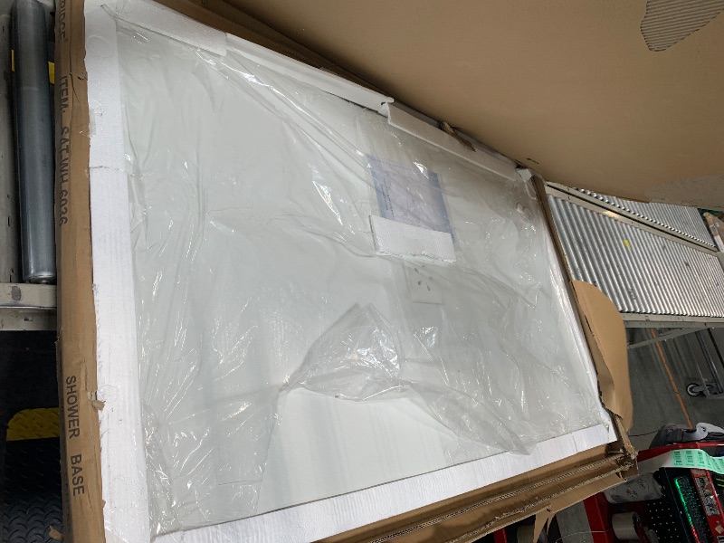 Photo 1 of ****FACTORY SEALED***
WOODBRIDGE 60" L x 36" W Zero-Threshold Shower Base for Wheelchair Access, Low-Profile Non-Slip Design with Center Drain, Matching Decorative Drain Plate and Tile Flange, White