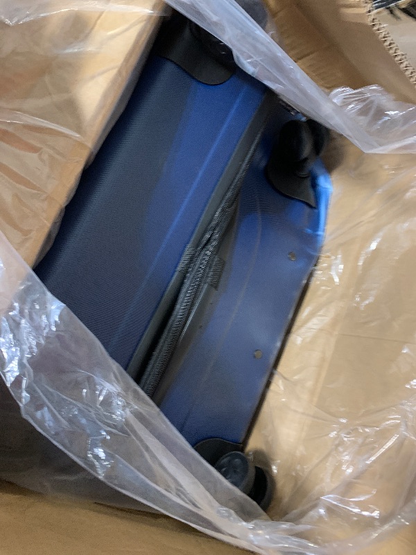 Photo 1 of ** SOLD AS IS NO REFUND/RETURN** SEE COMMENTS 
Amazon Basics 30" Hardside Large Checked Luggage with Multi-directional Wheels, Expandable for Up to 15% More Space, Scratch-Resistant Hardshell, Navy Blue