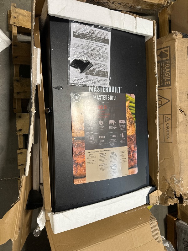 Photo 1 of ***UPDATED 5/9**UPDATED 5/17**** Masterbuilt® 40-inch Digital Electric Vertical BBQ Smoker with Side Wood Chip Loader, Chrome Smoking Racks and 970 Cooking Square Inches in Black, Model MB20072918