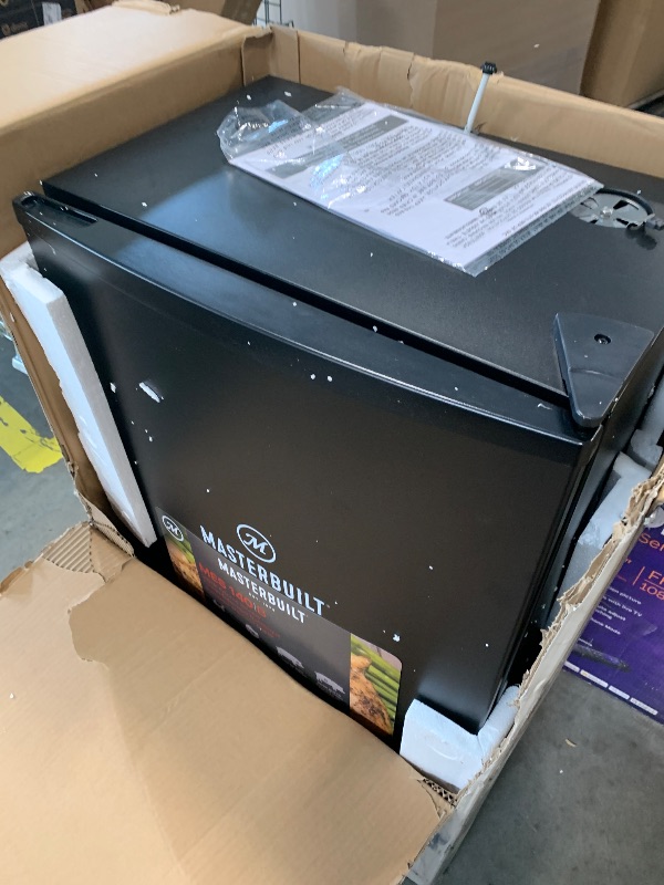 Photo 1 of ***UPDATED 5/9**UPDATED 5/17**** Masterbuilt® 40-inch Digital Electric Vertical BBQ Smoker with Side Wood Chip Loader, Chrome Smoking Racks and 970 Cooking Square Inches in Black, Model MB20072918