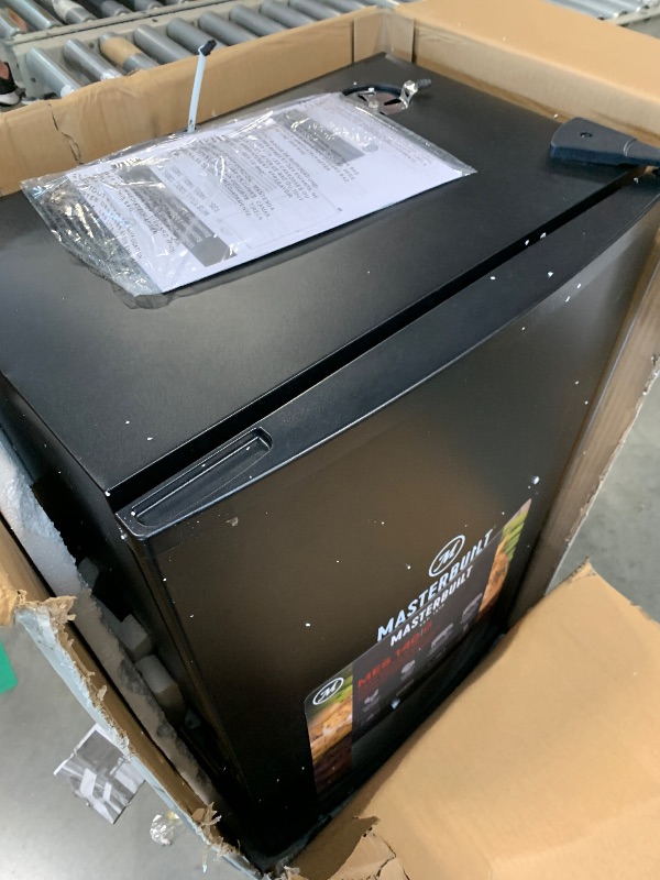 Photo 1 of ***UPDATED 5/9**UPDATED 5/17**** Masterbuilt® 40-inch Digital Electric Vertical BBQ Smoker with Side Wood Chip Loader, Chrome Smoking Racks and 970 Cooking Square Inches in Black, Model MB20072918
