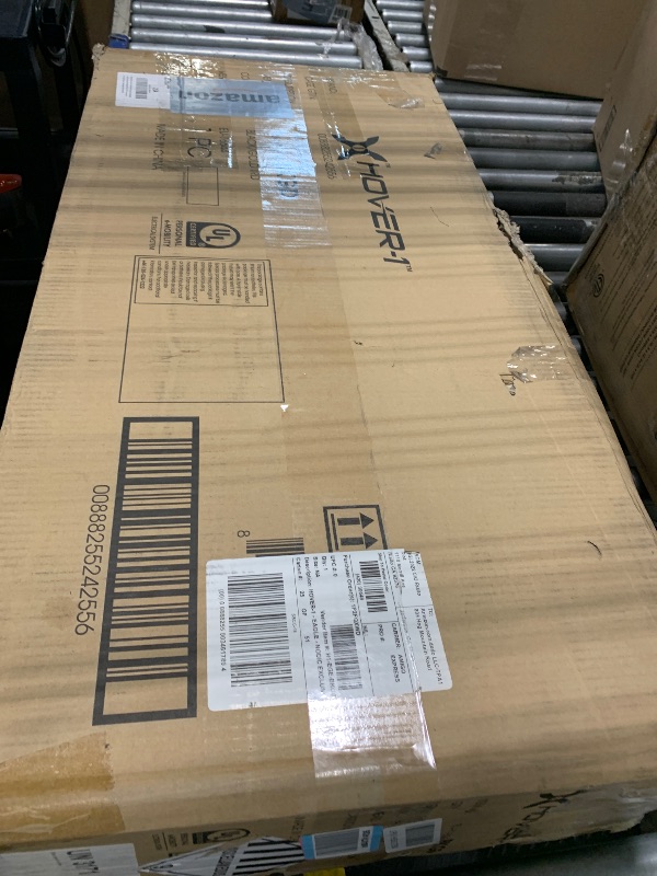 Photo 1 of *** MINOR DAMAGE TO HANDLES*** Hover-1 Eagle Foldable Electric Scooter with 300W Brushless Motor, 15 mph Max Speed, and 7 Miles Max Range