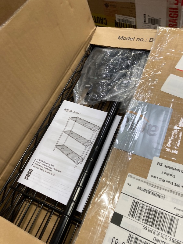 Photo 1 of **MISSING PARTS***Amazon Basics 3-Shelf Adjustable Heavy Duty Steel Wire Rack Storage Shelving Organizer with Storage Space, Versatility and Ease of Use for Kitchen, Garage, 23.2" L x 13.4" W x 30" H, Black