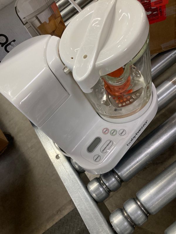 Photo 1 of ***DAMAGED -SELLING AS PARTS ONLY*** Baby Brezza One Step Baby Food Maker Deluxe – Auto shut Off, Dishwasher Safe Cooker and Blender to Steam + Puree Organic Food for Infants + Toddlers - Set of 3 Pouches + 3 Funnels