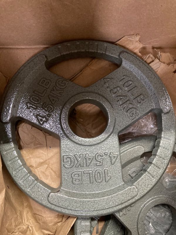 Photo 1 of **THIS IS FOR 4 WEIGHTS ALL 10 LB***Fitvids Cast Iron 2-Inch Olympic Weight Plate for Strength Training & Weightlifting, 4 TEN LB WEIGHTS
