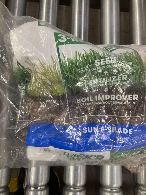 Photo 1 of ***USED- SELLING AS IS *** BScotts Turf Builder Thick'R Lawn Sun and Shade, 2 lb. - 3-in-1 Solution for Thin Lawns - Combination Seed, Fertilizer and Soil Improver for a Thicker, Greener Lawn - Covers 1,200 sq. ft.