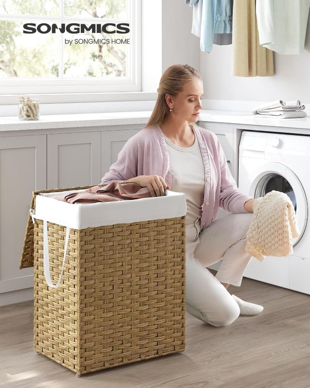 Photo 1 of  Laundry Hamper with Lid, 23.8 Gallon (90 L) Synthetic Rattan Clothes Laundry Basket with Lid and Handles, Foldable, Removable Liner, Goose Yellow