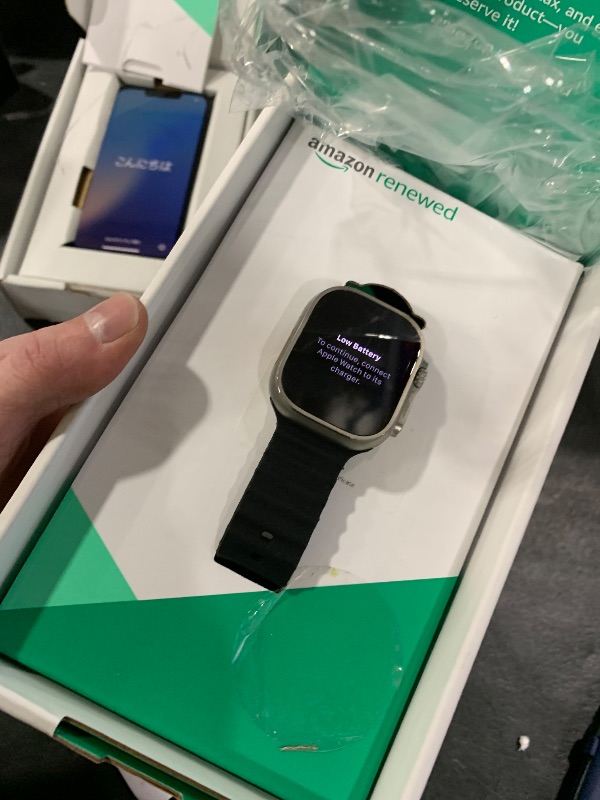 Photo 1 of Apple Watch Ultra [GPS + Cellular 49mm] Titanium Case with Midnight Ocean Band, One Size (Renewed Premium)