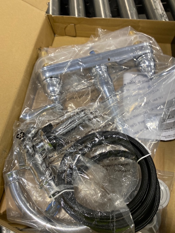 Photo 1 of Delta Windemere Chrome Kitchen Faucet with Side Sprayer, Traditional 4 Hole Kitchen Sink Faucet, Two-Handle, Chrome 21996LF