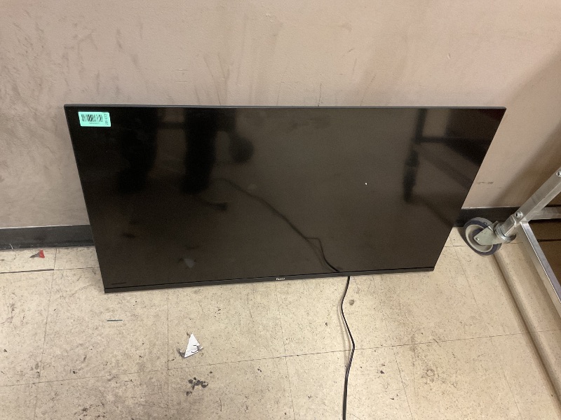 Photo 1 of Roku tv