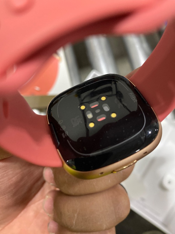 Photo 1 of Fitbit Versa 4 Fitness Smartwatch with Daily Readiness, GPS, 24/7 Heart Rate, 40+ Exercise Modes, Sleep Tracking and more, Pink Sand/Copper Rose, One Size (S & L Bands Included)