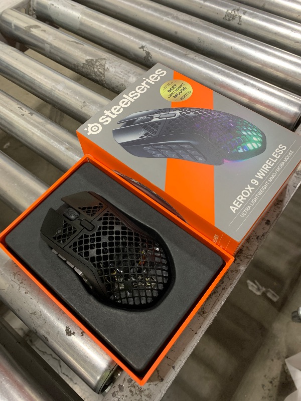 Photo 1 of SteelSeries Aerox 9 Wireless - Holey RGB Gaming Mouse - Ultra-lightweight Water Resistant Design - 18 Buttons – Bluetooth/2.4 GHz - 18K DPI TrueMove Air Optical Sensor