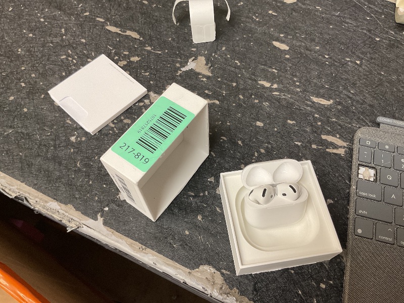 Photo 1 of Apple AirPods 4 Wireless Earbuds, Bluetooth Headphones, with Active Noise Cancellation, Adaptive, Transparency Mode, Personalized Spatial Audio, USB-C Charging Case, Wireless Charging, H2 Chip