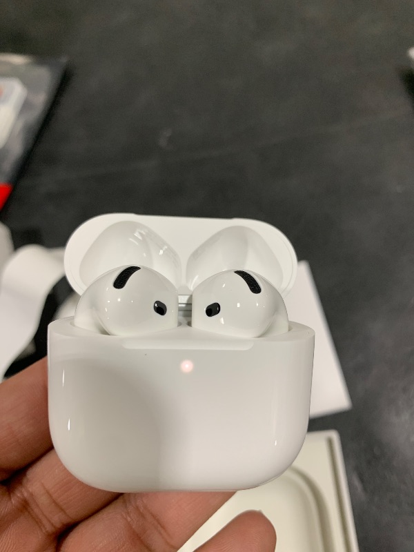 Photo 1 of Apple AirPods 4 Wireless Earbuds, Bluetooth Headphones, with Active Noise Cancellation, Adaptive, Transparency Mode, Personalized Spatial Audio, USB-C Charging Case, Wireless Charging, H2 Chip