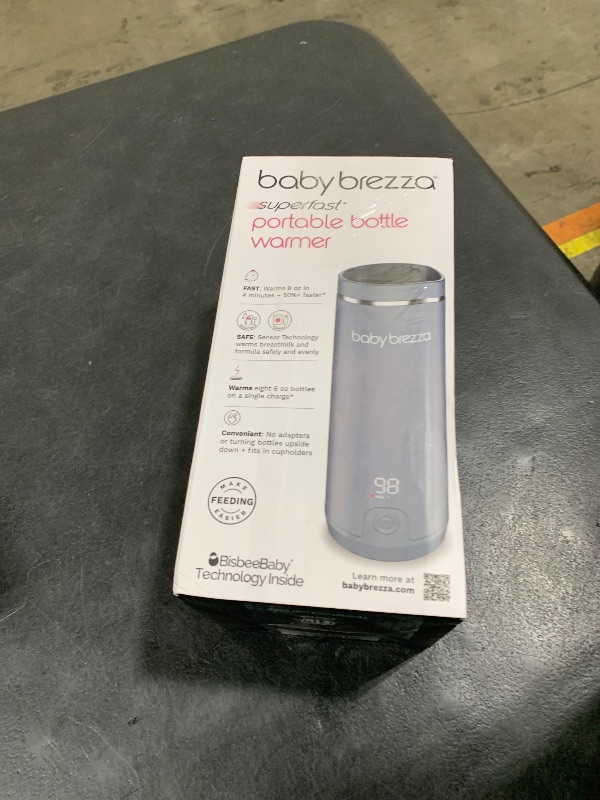 Photo 1 of Baby Brezza Portable Warmer – 3X Faster Baby Bottle Warming - Travel Breastmilk and Formula Warmer - Safe, Even Heating - Up to 9oz - No Adapters, Grey
