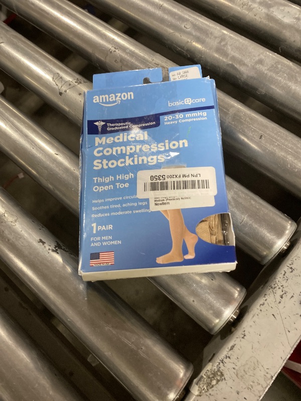 Photo 1 of Amazon Basic Care Medical Compression Stockings for Circulation, Varicose Veins, Swelling, Edema, 20-30 mmHg, Women & Men Thigh Length Hose, Open Toe, Breathable, Beige, Large (Previously NuVein)
