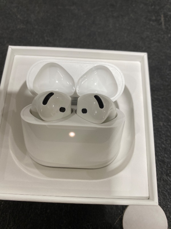 Photo 1 of Apple AirPods 4 Wireless Earbuds, Bluetooth Headphones, with Active Noise Cancellation, Adaptive, Transparency Mode, Personalized Spatial Audio, USB-C Charging Case, Wireless Charging, H2 Chip