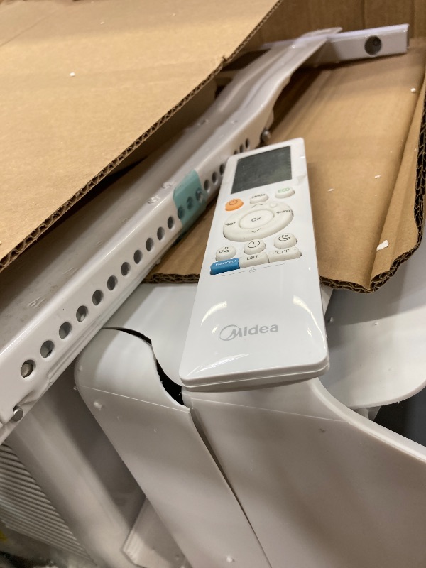 Photo 1 of ***DAMAGED -SELLING AS PARTS**** Midea 8,000 BTU U Shaped Smart Inverter Window Air Conditioner - Cools 350 Sq Ft, Ultra Quiet with Open Window Flexibility - Alexa/Google Assistant Compatible - 37% Energy Savings, Remote (Updated)