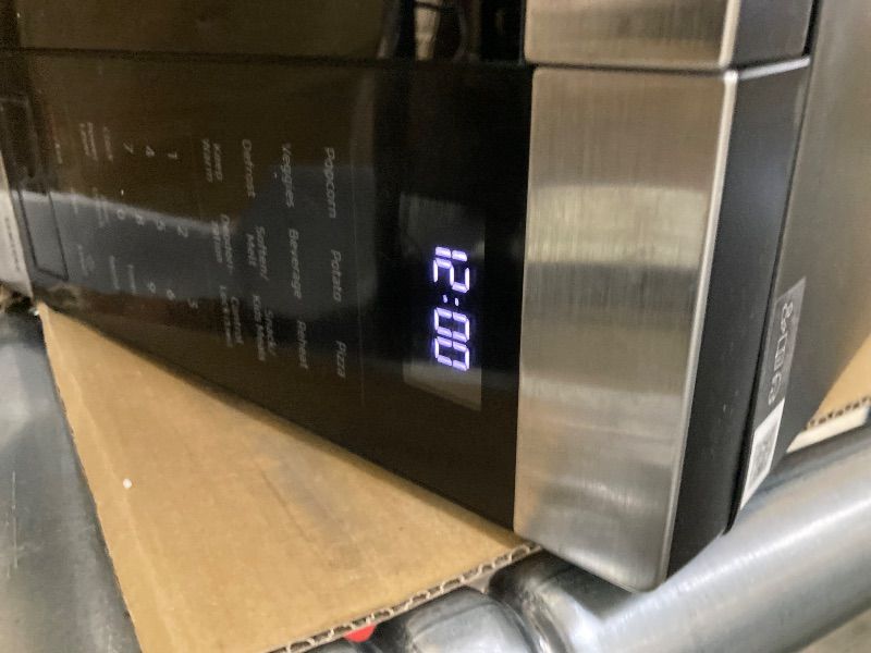 Photo 1 of ***DAMAGED -DENTS, SCUFFS/SCRATCHES, -SELLING AS IS *** SAMSUNG 1.9 cu. ft. Countertop Microwave with Sensor Cooking, Stainless Steel, MS19DG8500SRAA