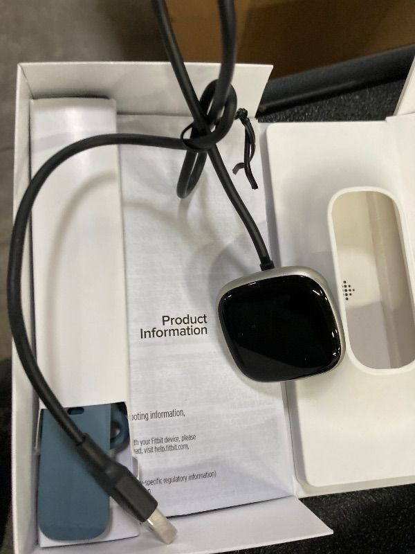 Photo 1 of **WONT CHARGE**Fitbit Versa 4 Fitness Smartwatch with Daily Readiness, GPS, 24/7 Heart Rate, 40+ Exercise Modes, Sleep Tracking and more, Waterfall Blue/Platinum, One Size (S & L Bands Included)