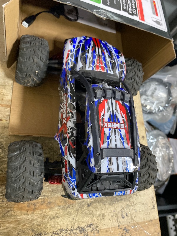 Photo 1 of **TESTED AND WROKING, BATTERIES NO INCLUDED FOR REMOTE**
SIMREX 1/16 Scale Hobby Grade RC Car, 36 KPH High Speed 4WD Remote Control Monster Truck, All Terrain Off-Road 4x4 Vehicle w/ 2.4 GHz Radio, Electric RC Truck for Kids & Adults Outdoor Play