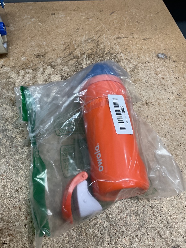 View 2 of *lid broken* Owala Kids FreeSip Insulated Stainless Steel Water Bottle with Straw for Sports, Travel, and School BPA-Free Sports Water Bottle, 16 oz, Blue Citrus