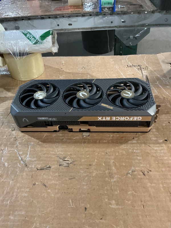 Photo 1 of ***POTENTIAL PARTS ONLY - REPORTED TO NOT BOOT***
ZOTAC GeForce RTX 5090 Solid OC Graphics Card, NVIDIA, 32GB GDDR7, DLSS 4, 3× DisplayPort 2.1b & HDMI 2.1b, PCIE 5.0 (ZT-B50900J-10P)
