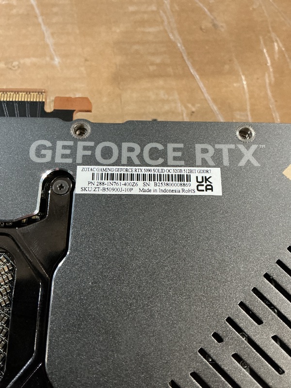 Photo 1 of ***POTENTIAL PARTS ONLY - REPORTED TO NOT BOOT***
ZOTAC GeForce RTX 5090 Solid OC Graphics Card, NVIDIA, 32GB GDDR7, DLSS 4, 3× DisplayPort 2.1b & HDMI 2.1b, PCIE 5.0 (ZT-B50900J-10P)
