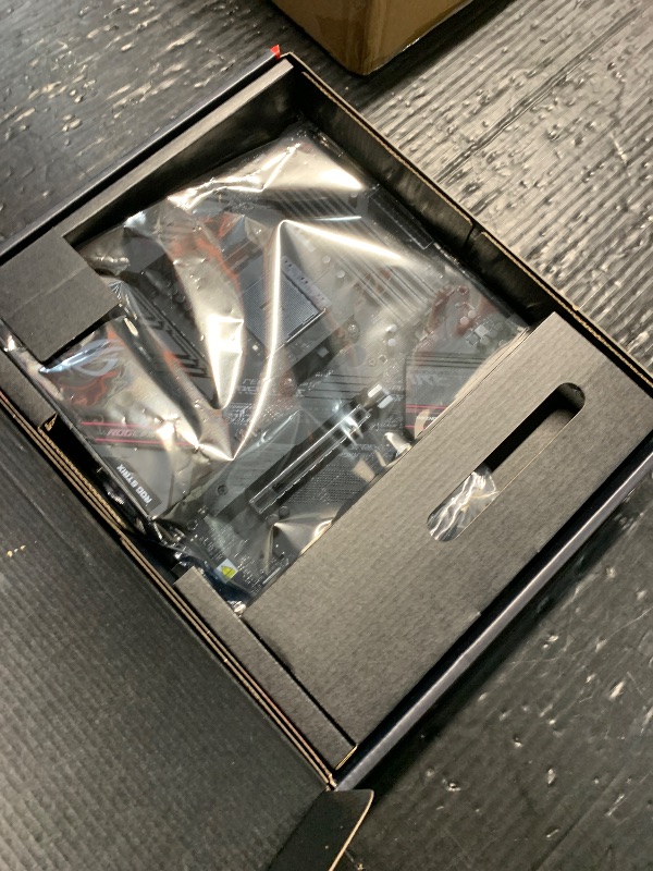 Photo 1 of *** COVER TO CPU IS BROKEN***
Asus ROG Strix B550-F Gaming WiFi II AMD AM4 (3rd Gen Ryzen) ATX Gaming Motherboard (PCIe 4.0,WiFi 6E, 2.5Gb LAN, BIOS Flashback, HDMI 2.1, Addressable Gen 2 RGB Header and Aura Sync)