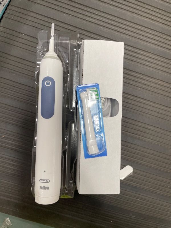 Photo 1 of **SEE NOTES***Oral-B Pro 1000 CrossAction Electric Toothbrush, Green