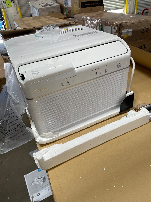 Photo 1 of (sold as parts, unfunctional) Midea Inverter Window Air Conditioner with Heat – Quiet Window AC Unit and Heat Combo with Dehumidifier – Cools up to 550 Sq. Ft. – Energy Star Rated, Smart Control, Remote, 12,000 BTU