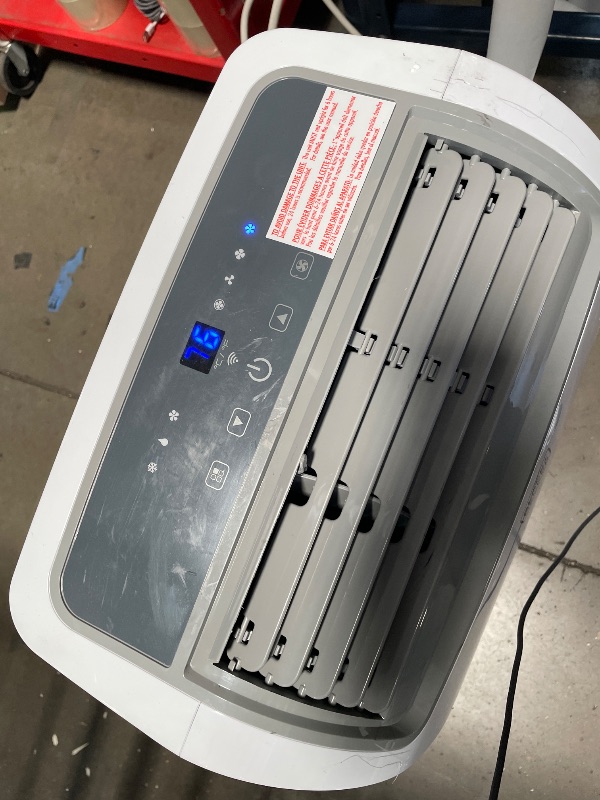 Photo 1 of ***MISSING PARTS***
BLACK+DECKER Portable Air Conditioner, 12,000 BTU Cooling, 9,000 BTU Heating for Rooms up to 550 Sq. Ft., Follow Me Remote, Smart AC Unit, BPACT12HWT, White
