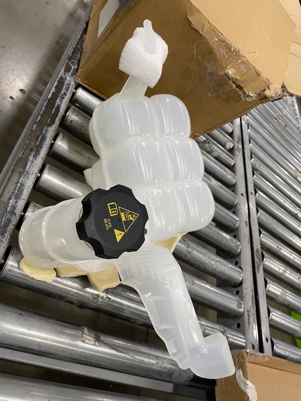 Photo 1 of automotive coolant reservoir