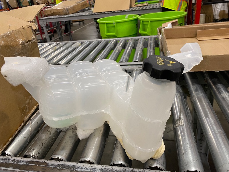 Photo 1 of automotive coolant reservoir