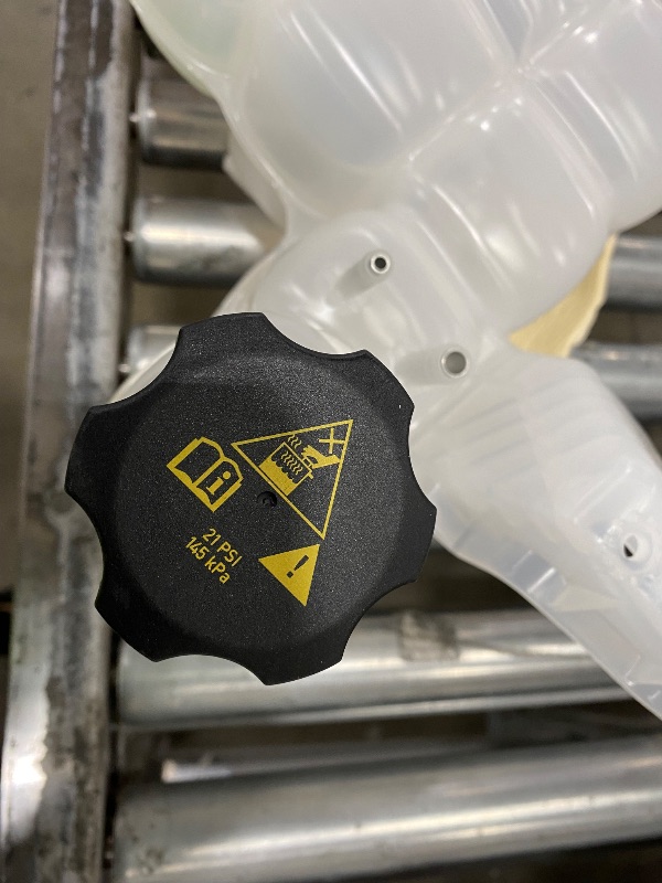 Photo 1 of automotive coolant reservoir