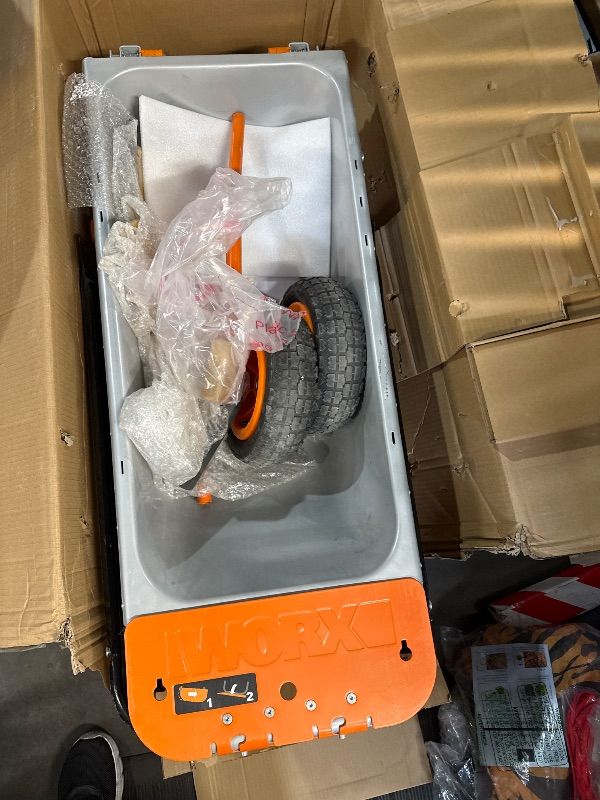 Photo 1 of ***MISSING PARTS***
*previously used*has minor damage* still functional* see photos* Worx WG050 8-in-1 Aerocart Garden Cart/Wheelbarrow Heavy Duty/Dolly