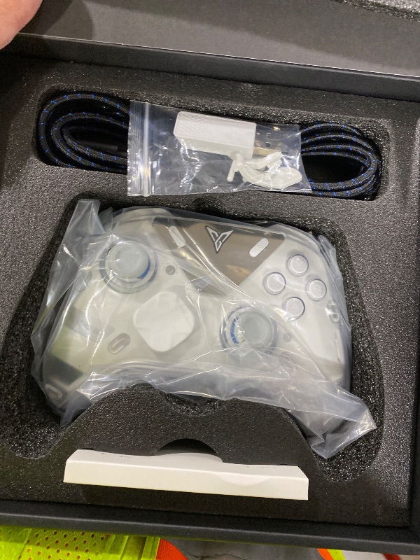 Photo 1 of FLYDIGI Apex 5 PC Controller, Forceflex Joystick 2.0, ForceAdapt Triggers, 3ms Ultra-Low Latency, RGB Light Bar, Full-Color LCD Display,1500mAh Battery PC/NS/Android/TV