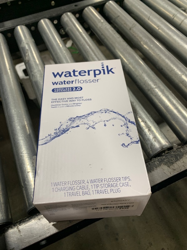Photo 1 of Waterpik Cordless Advanced 2.0 Water Flosser For Teeth, Gums, Braces, Dental Care With Travel Bag and 4 Tips, ADA Accepted, Rechargeable, Portable, and Waterproof, White WP-580, Packaging May Vary
