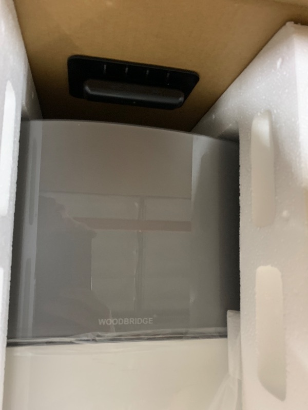 Photo 1 of WOODBRIDGE Smart Toilet 1.28 GPF Dual Flush, Auto Open & Close, Auto Flush, Foot Sensor,1000 Gram MaP Flushing Score,Movement Drying,Heated Seat,ADA Chair Height and Cleaning Foam Dispenser