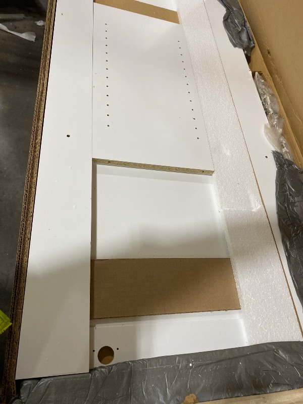 Photo 1 of Prepac Elite 54" W Wall Cabinet with Panel Doors, White Storage Cabinet, Bathroom Cabinet, Pantry with 1 Adjustable Shelf 12.75" D x 54" W x 24" H, WSUR-1004-1