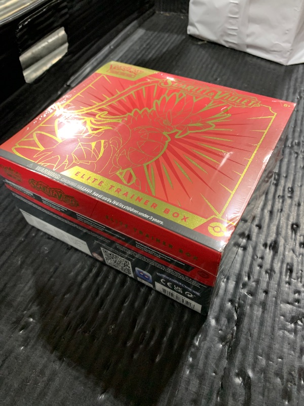 Photo 1 of Pokémon TCG: Scarlet & Violet Elite Trainer Box (Miraidon Purple or Koraidon Red, Random Color)