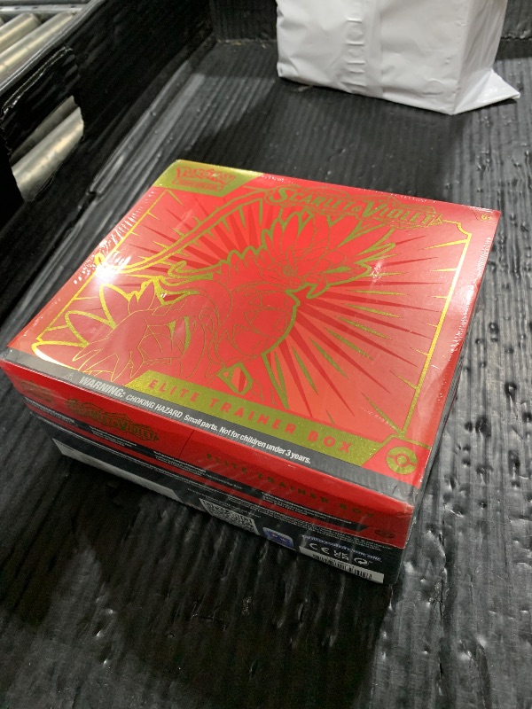 Photo 1 of Pokémon TCG: Scarlet & Violet Elite Trainer Box (Miraidon Purple or Koraidon Red, Random Color)