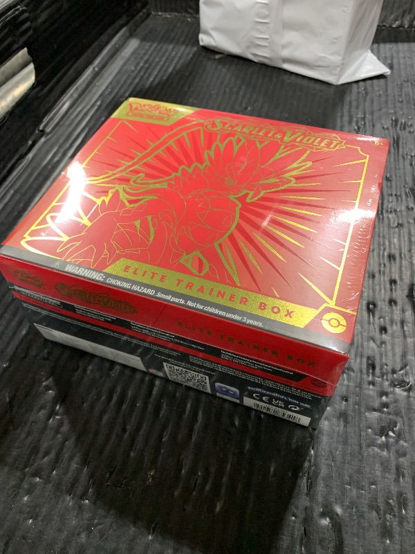 Photo 1 of Pokémon TCG: Scarlet & Violet Elite Trainer Box (Miraidon Purple or Koraidon Red, Random Color)