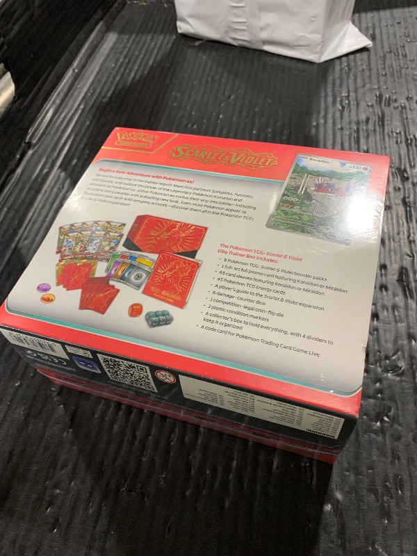 Photo 1 of Pokémon TCG: Scarlet & Violet Elite Trainer Box (Miraidon Purple or Koraidon Red, Random Color)