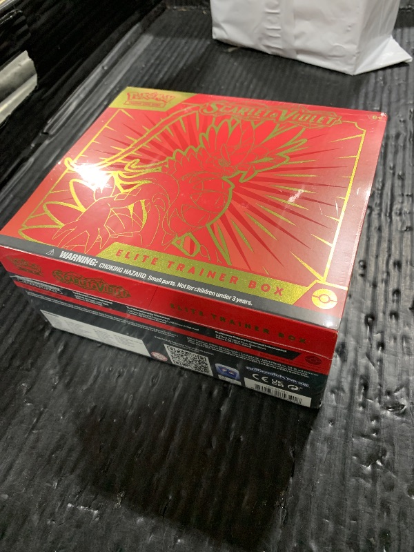 Photo 1 of Pokémon TCG: Scarlet & Violet Elite Trainer Box (Miraidon Purple or Koraidon Red, Random Color)